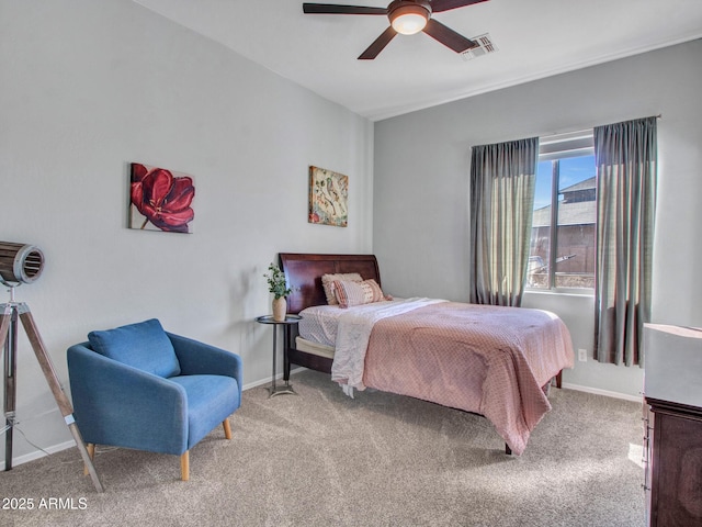 bedroom with ceiling fan and carpet flooring