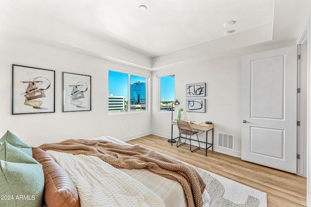 bedroom featuring wood-type flooring