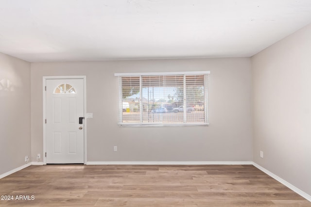 foyer with light wood-type flooring