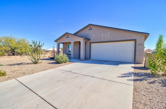 single story home featuring a garage