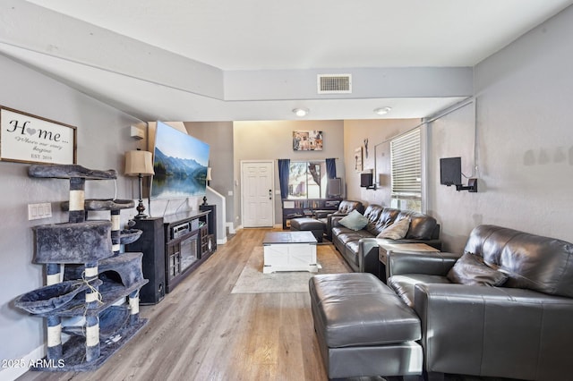 living room featuring light wood-type flooring