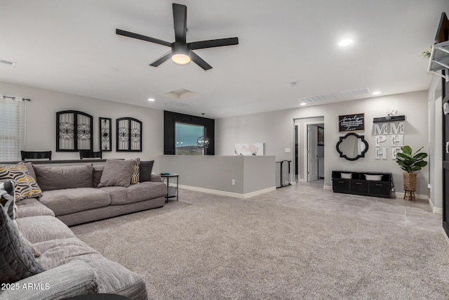 living room featuring recessed lighting, baseboards, and carpet floors