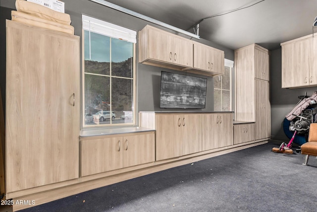 kitchen with light brown cabinets