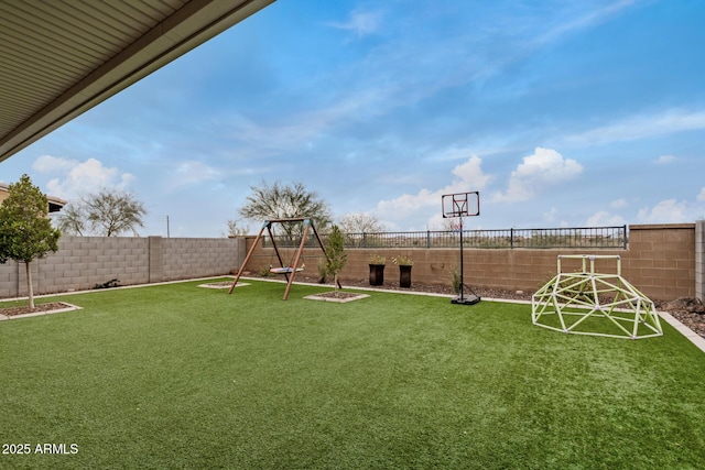 view of yard with a fenced backyard