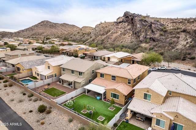 bird's eye view with a mountain view and a residential view