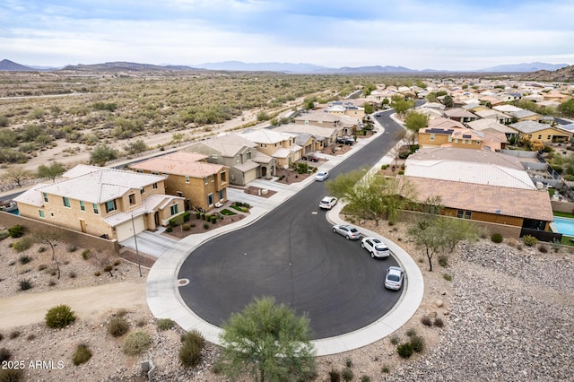 aerial view with a mountain view and a residential view