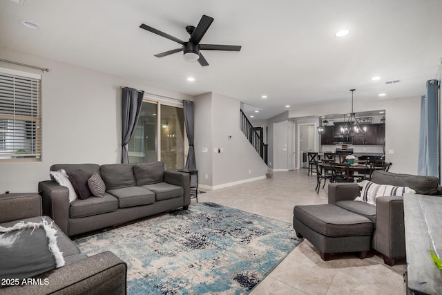 living area featuring stairs, recessed lighting, visible vents, and a ceiling fan