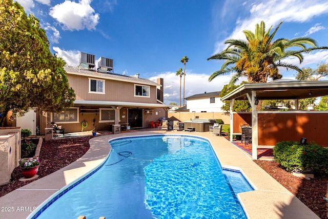 3377 W Grandview Rd, Phoenix, AZ 85053 - view of swimming pool with fence, a gazebo, a hot tub, a fenced in pool, and a patio area