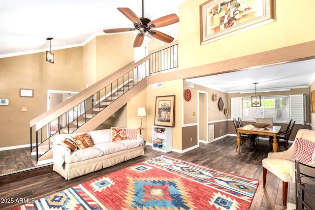 3377 W Grandview Rd, Phoenix, AZ 85053 - living area featuring a ceiling fan, baseboards, wood finished floors, and stairway