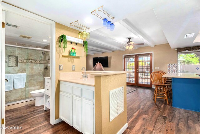 3377 W Grandview Rd, Phoenix, AZ 85053 - interior space featuring ceiling fan, a sink, dark wood finished floors, french doors, and visible vents