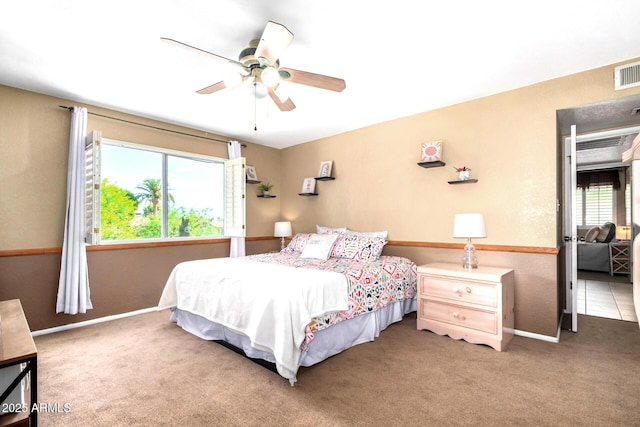 3377 W Grandview Rd, Phoenix, AZ 85053 - carpeted bedroom featuring baseboards, ceiling fan, and visible vents