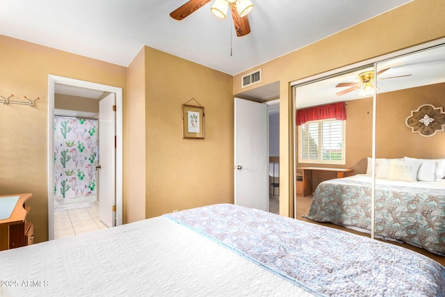 3377 W Grandview Rd, Phoenix, AZ 85053 - bedroom featuring visible vents, tile patterned flooring, a textured wall, a closet, and a ceiling fan