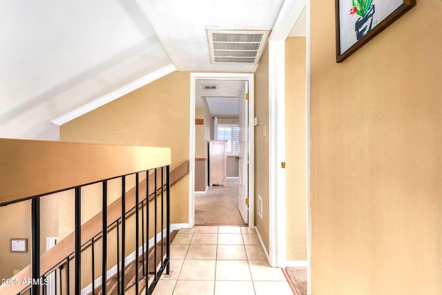 3377 W Grandview Rd, Phoenix, AZ 85053 - hall with visible vents, tile patterned flooring, baseboards, and lofted ceiling