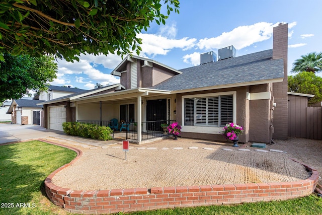 3377 W Grandview Rd, Phoenix, AZ 85053 - view of front of house with a garage, fence, stucco siding, a shingled roof, and driveway