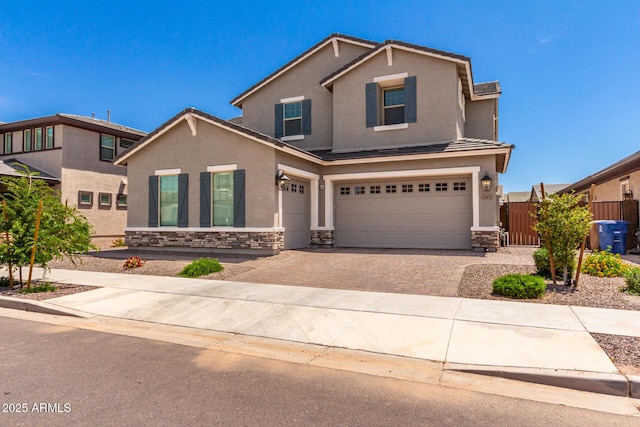 20451 E Via De Colina, Queen Creek, AZ 85142 - traditional-style home featuring stone siding, stucco siding, driveway, and an attached garage