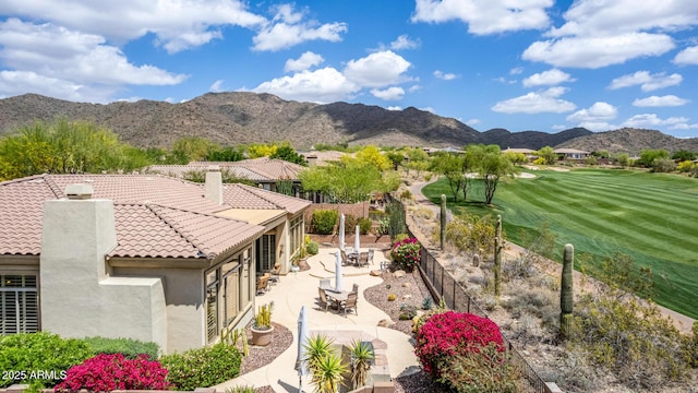 view of mountain feature with golf course view