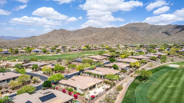 bird's eye view with a residential view, a mountain view, and golf course view