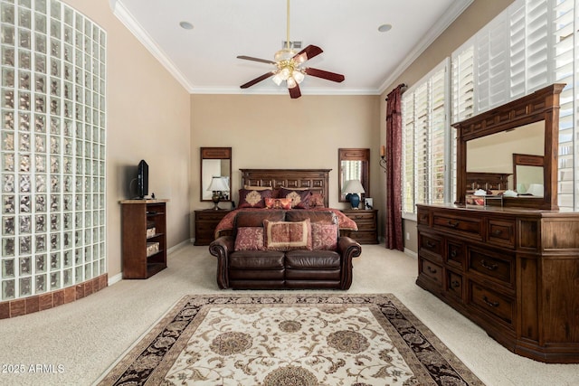 bedroom featuring carpet flooring, a ceiling fan, crown molding, and baseboards