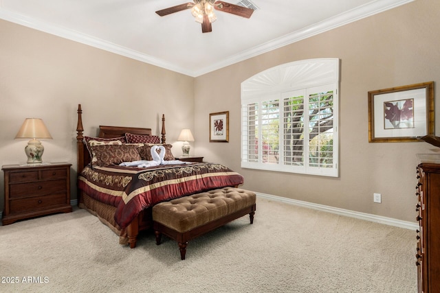 carpeted bedroom with baseboards, ornamental molding, ceiling fan, and visible vents