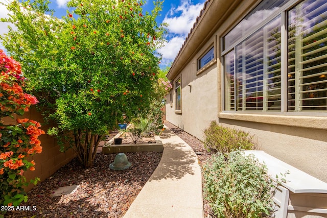 view of home's exterior with stucco siding