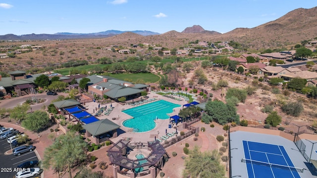birds eye view of property featuring a mountain view