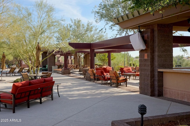 view of home's community featuring a patio and an outdoor living space