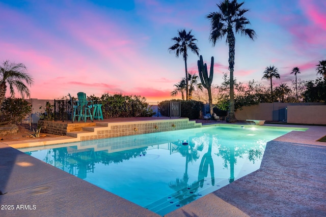 view of pool featuring a fenced in pool, a fenced backyard, and a patio