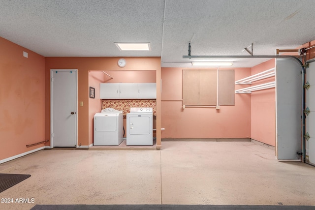 garage with washer and dryer