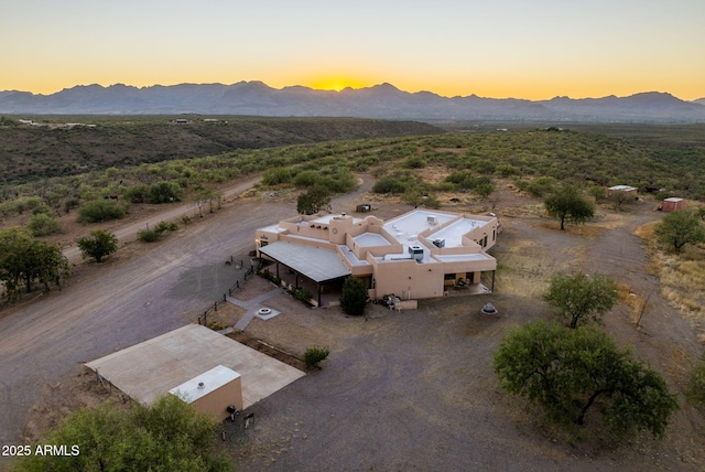 aerial view at dusk with a mountain view