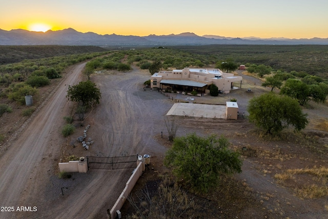 aerial view at dusk with a mountain view