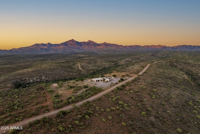 aerial view at dusk with a mountain view