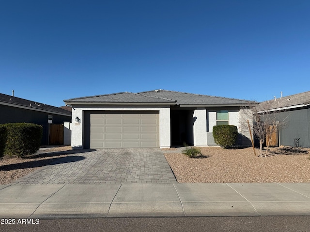 view of front of property with a garage