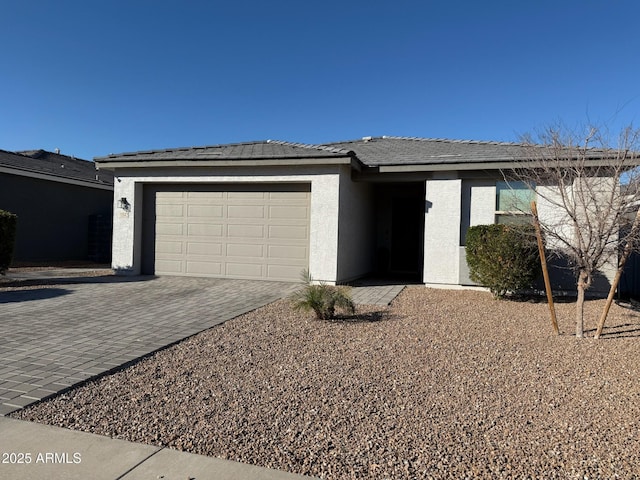 view of front of property featuring a garage