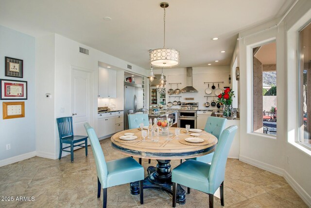 5281 W Quail Ave, Glendale, AZ 85308 - dining space featuring baseboards