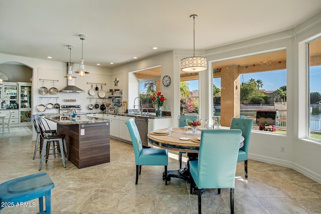 5281 W Quail Ave, Glendale, AZ 85308 - dining area featuring recessed lighting and arched walkways