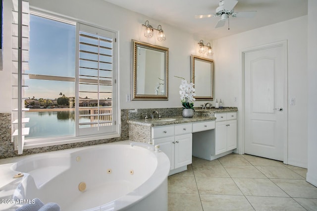 5281 W Quail Ave, Glendale, AZ 85308 - full bathroom featuring a whirlpool tub, tile patterned floors, double vanity, and a ceiling fan