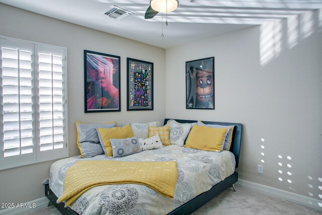 5281 W Quail Ave, Glendale, AZ 85308 - bedroom with carpet floors, multiple windows, baseboards, and a ceiling fan