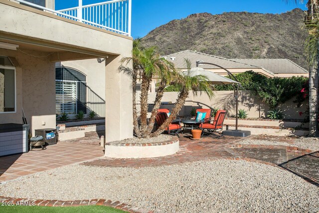 5281 W Quail Ave, Glendale, AZ 85308 - view of patio / terrace featuring a mountain view, a balcony, and fence