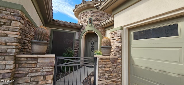 19245 W Pasadena Ave, Litchfield Park, AZ 85340 - entrance to property with stone siding and a garage