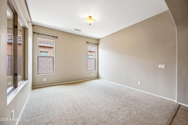 19245 W Pasadena Ave, Litchfield Park, AZ 85340 - spare room with baseboards and carpet floors