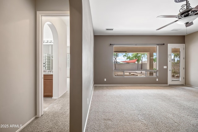 19245 W Pasadena Ave, Litchfield Park, AZ 85340 - entryway featuring carpet, ceiling fan, and plenty of natural light