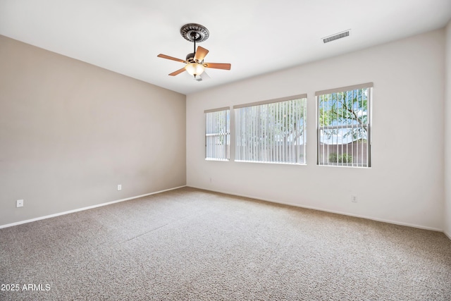19245 W Pasadena Ave, Litchfield Park, AZ 85340 - carpeted empty room featuring a ceiling fan and baseboards