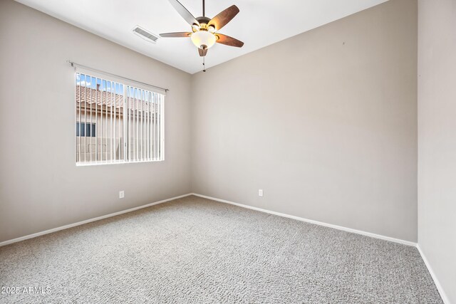 19245 W Pasadena Ave, Litchfield Park, AZ 85340 - carpeted spare room with a ceiling fan and baseboards