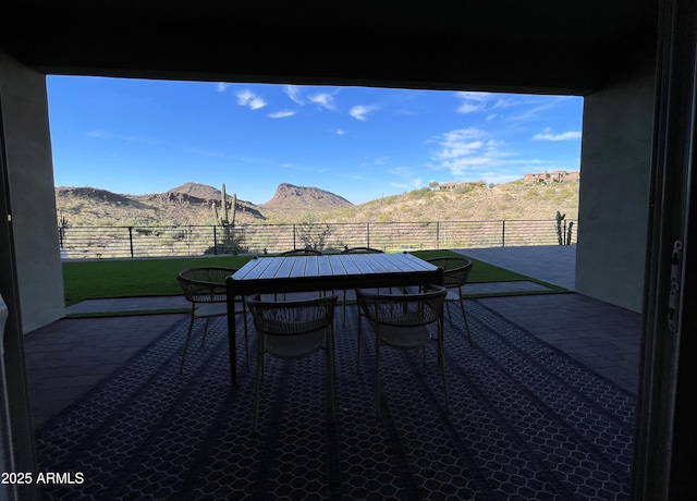 view of patio with a mountain view