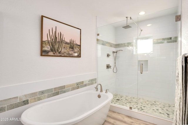 13620 N 80th Pl, Scottsdale, AZ 85260 - bathroom with a stall shower, a soaking tub, and wood finished floors