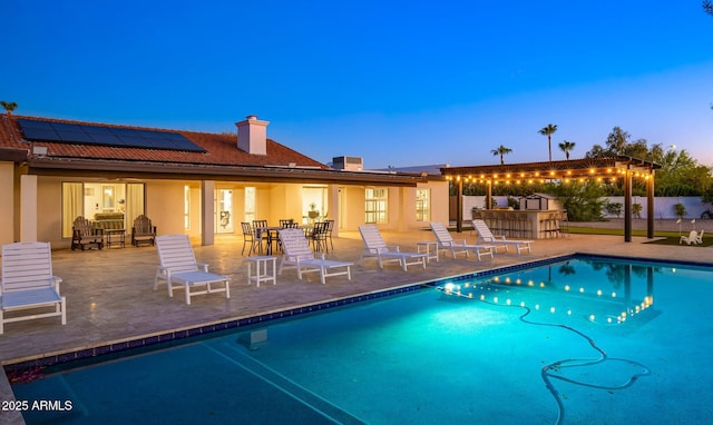 13620 N 80th Pl, Scottsdale, AZ 85260 - pool at dusk with an outdoor pool and a patio area