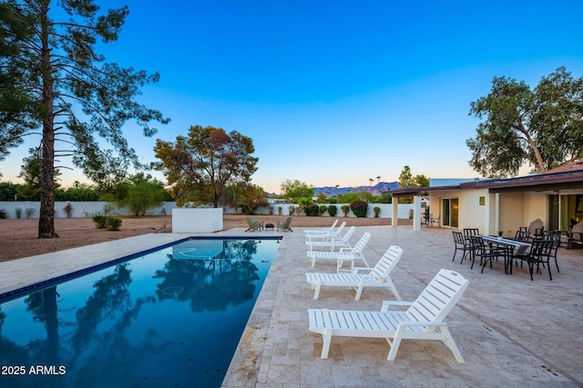 13620 N 80th Pl, Scottsdale, AZ 85260 - pool at dusk featuring a patio area and an outdoor pool