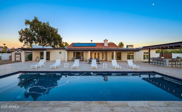 13620 N 80th Pl, Scottsdale, AZ 85260 - pool at dusk featuring a patio area and an outdoor pool
