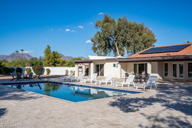 13620 N 80th Pl, Scottsdale, AZ 85260 - view of swimming pool featuring french doors, a patio area, and a mountain view