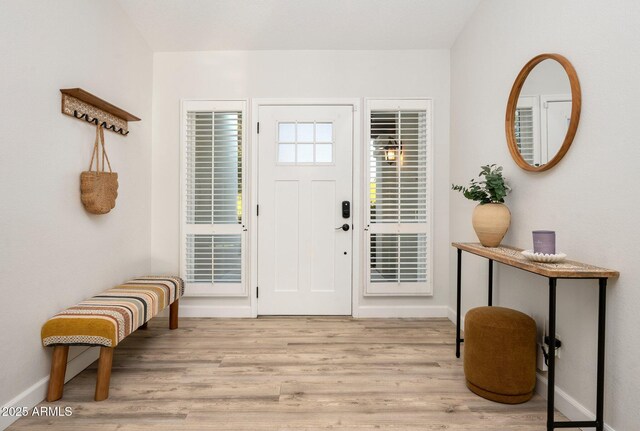 13620 N 80th Pl, Scottsdale, AZ 85260 - entryway with baseboards and wood finished floors
